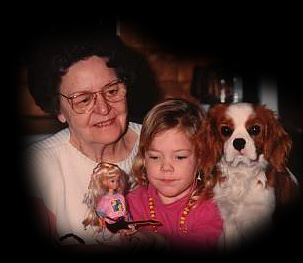Klik voor foto in apart venster johanna_van_den_broek_1919_met_kleindochter_denise_en_hondje_donny.jpg
